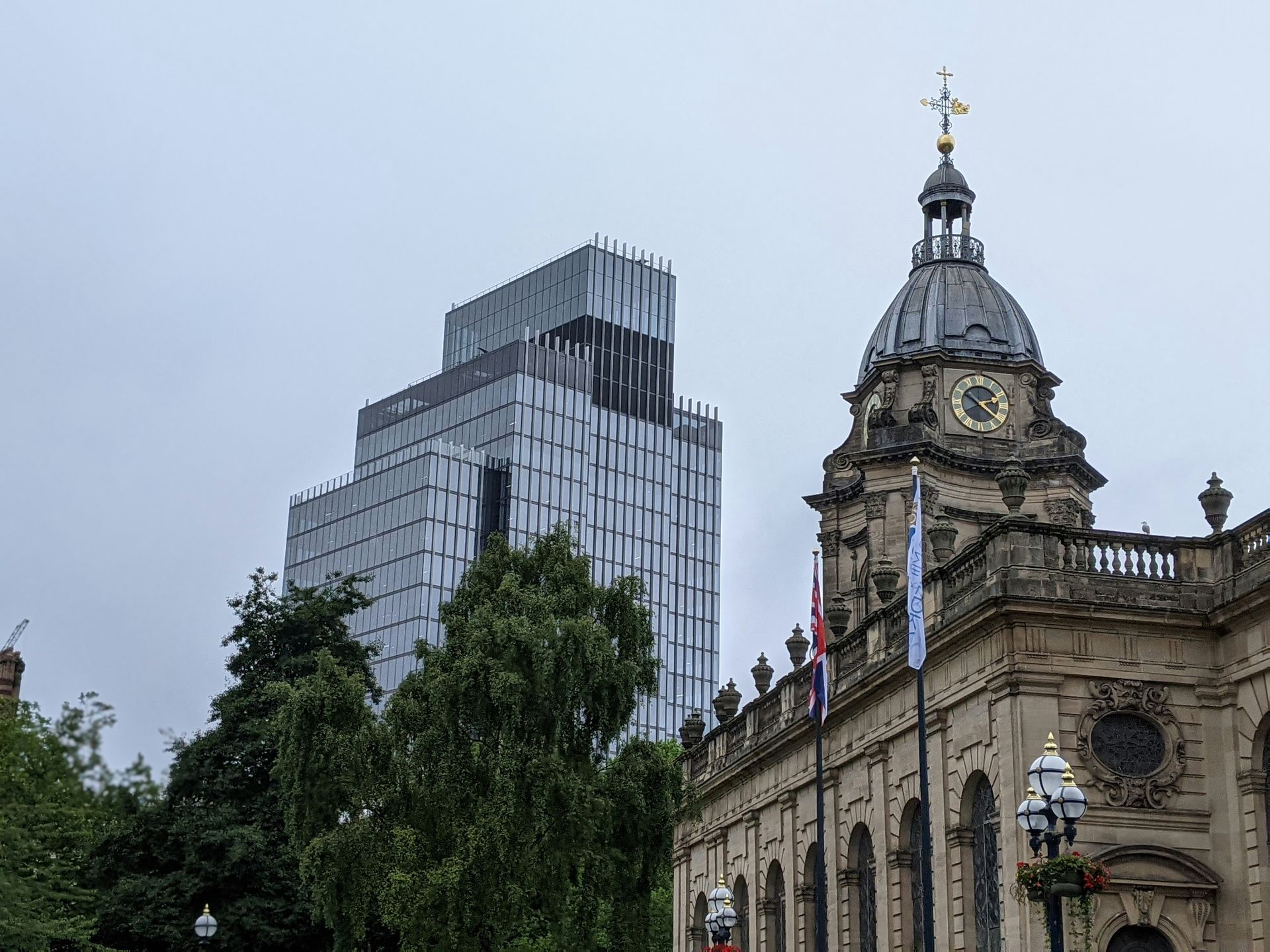 Birmingham skyline showing Birmingham Council House clock tower alongside modern office towers