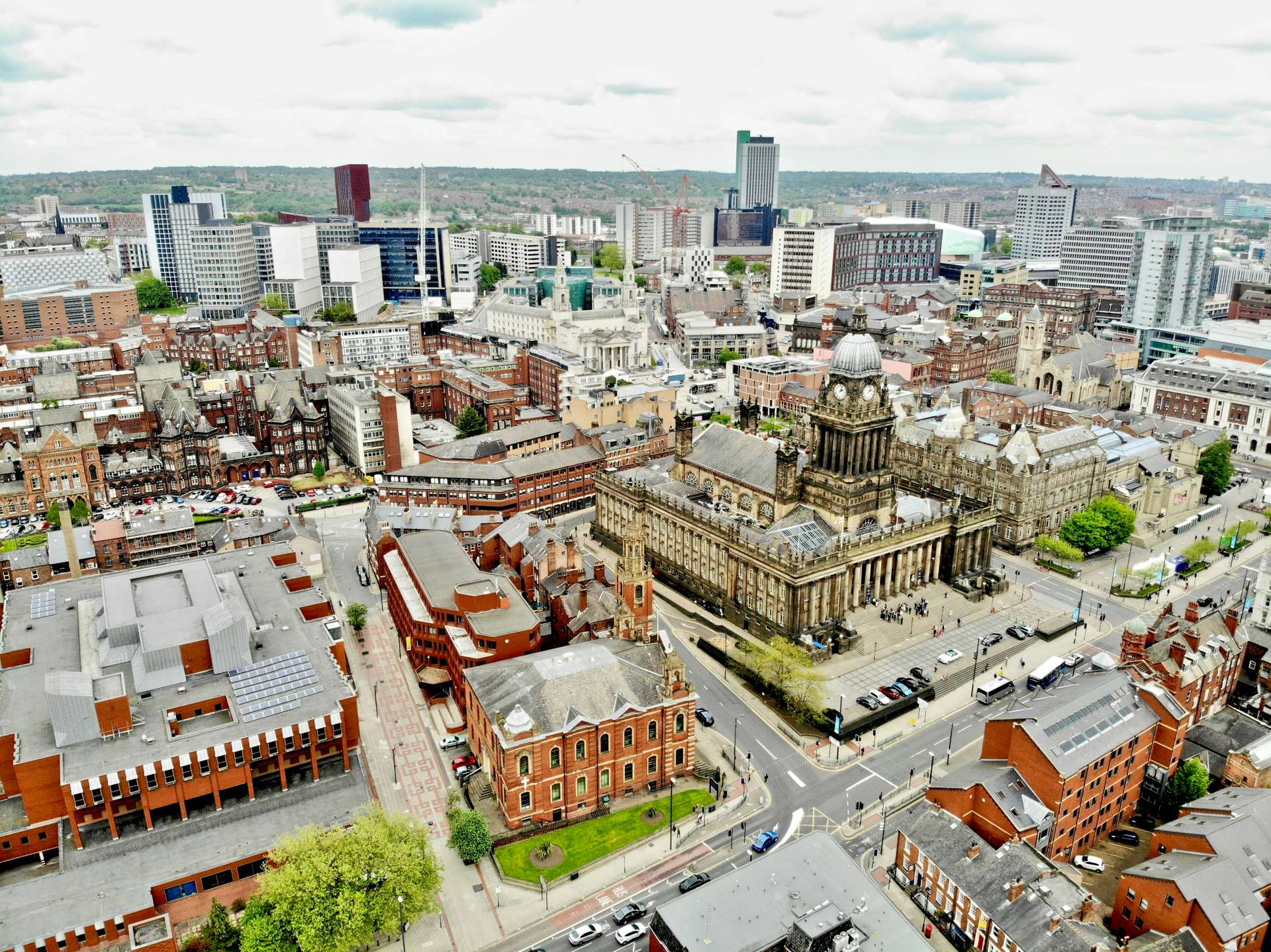 Aerial view of Leeds city centre showing Leeds Town Hall and the surrounding regeneration area